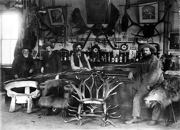 Unique furniture fills the Table Bluff Hotel and Saloon in Table Bluff, California, 1889.