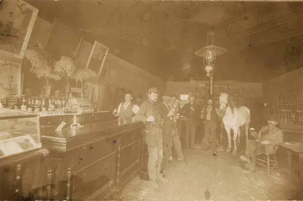 The interior of a saloon in Castle Dale, Utah, where one of the patrons apparently decided to pose with a horse.