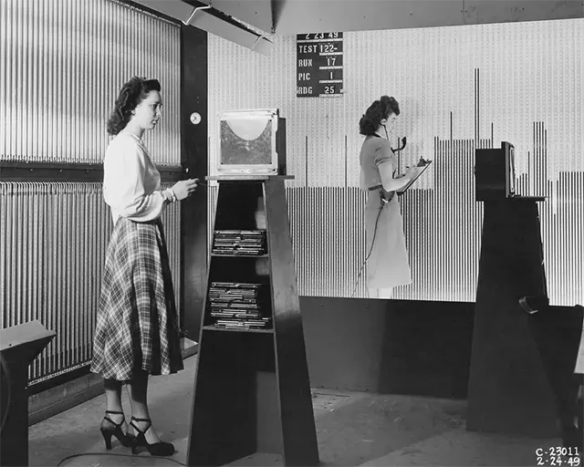 Women working as “computers” at NACA in 1949 gather air pressure readings.