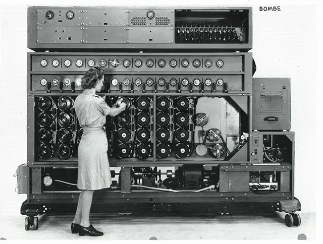 Woman working on a Bombe computing device.