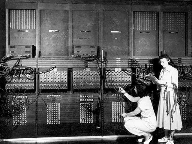 Marlyn Wescoff (standing) and Ruth Lichterman reprogram the ENIAC in 1946.