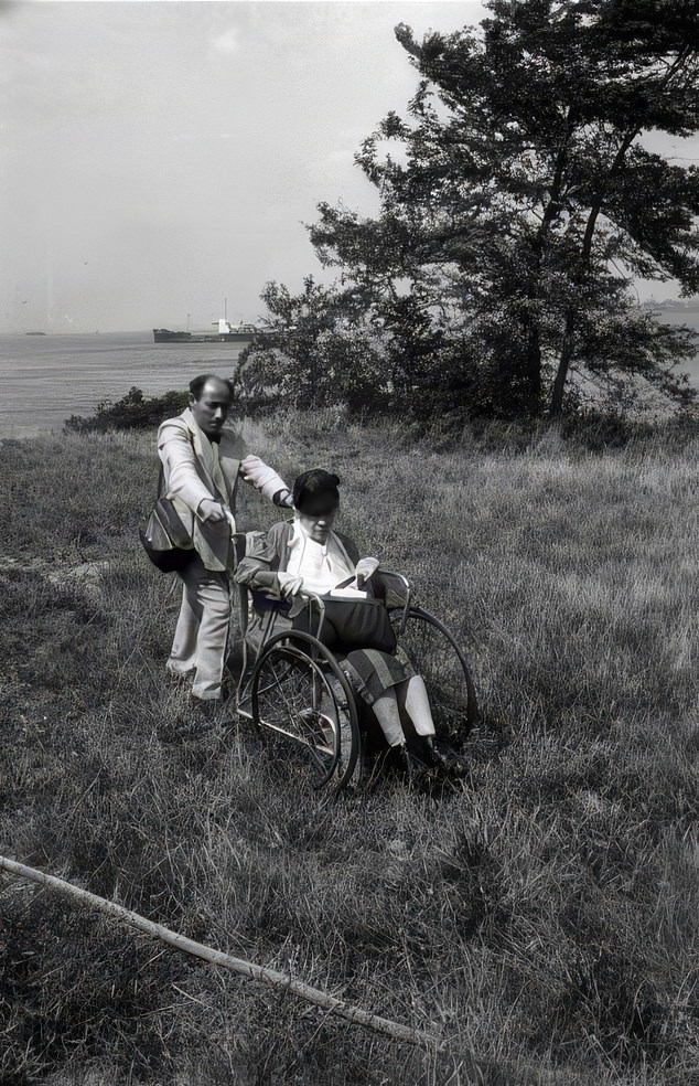 Alfred Eisenstaedt pushes photographer Alice Austen in a wheelchair, Staten Island, New York, in 1951, one year before Austen died.