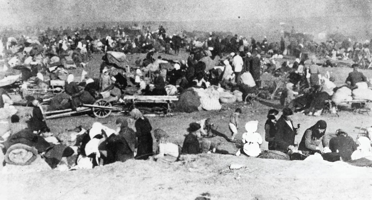 Women, children, and old men cluster on the outskirts of Stalingrad, 1942.