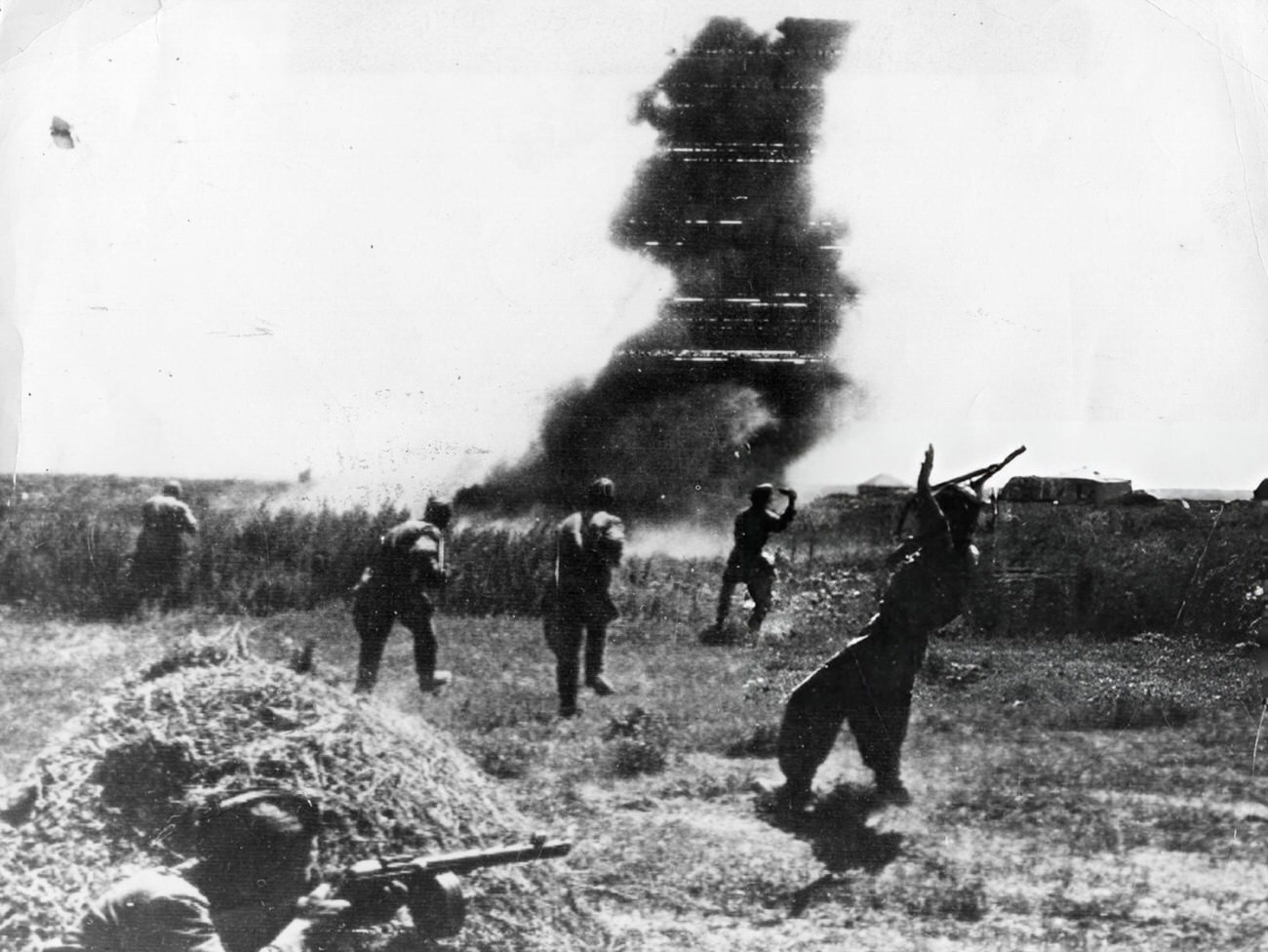 Soldiers face an explosion in the thick of the battle for Stalingrad, 1942.