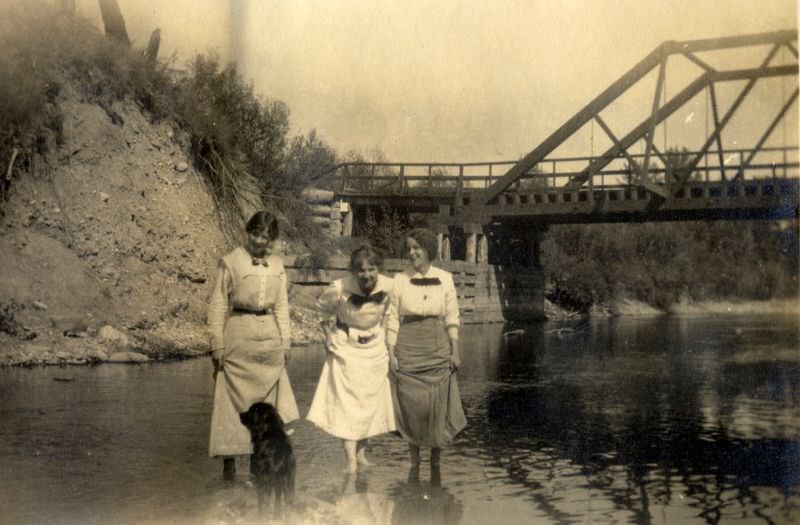 Three yong women at the river