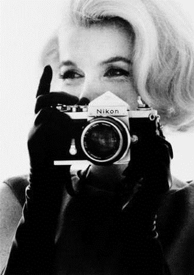 Marilyn Monroe with a Nikon camera