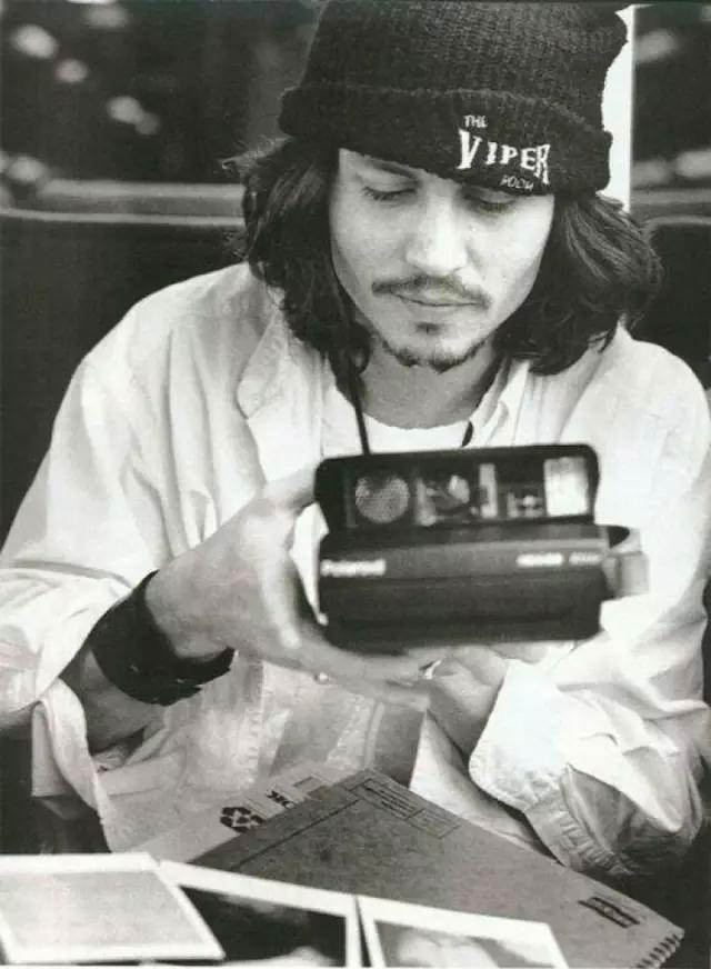 Johnny Depp with a Polaroid