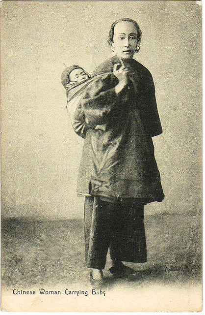 This lady carrying her baby on her back does not appear to have had her feet bound. If she was from the province of Guangdong (Canton), this may have meant she was a younger daughter in a poor family.