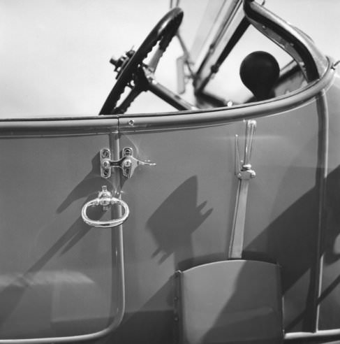 Detail of a 1914 Rolls-Royce Silver Ghost, owned by D.A. Marshall of Toronto, Canada, showing door latch and outside brake