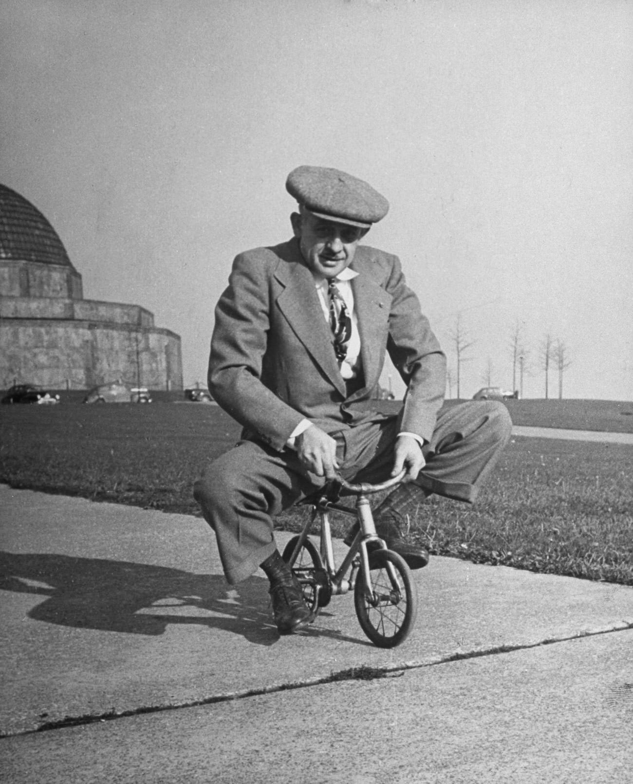 Chicago bicycle dealer Andy Koslow rides a tiny bike built by a former vaudevillian.