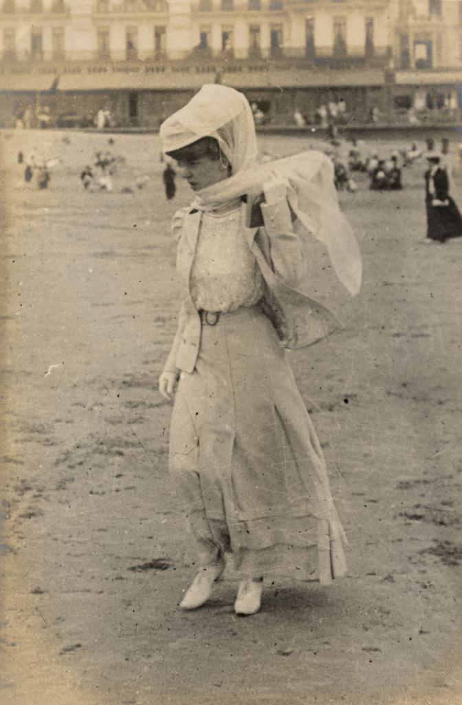 A stylish young woman goes for a stroll.