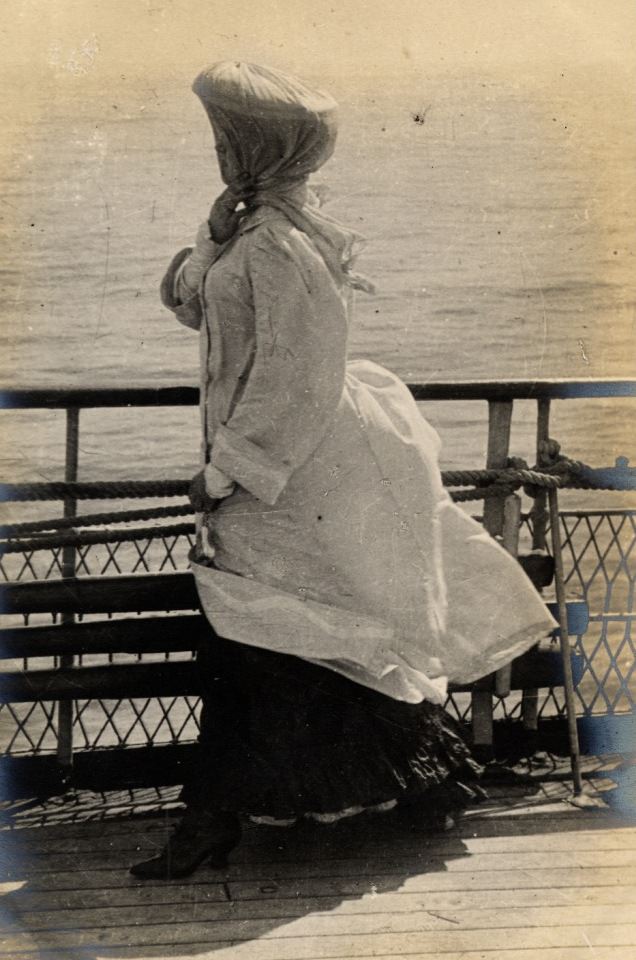 Crossing the channel on a ferry. This woman having difficulty with a sea breeze.