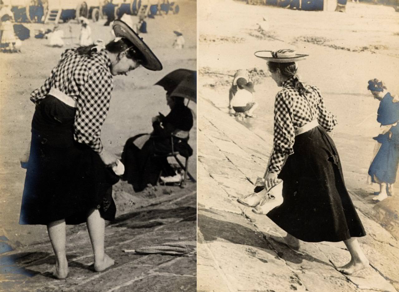 A young woman goes barefoot to walk up the paved slope from the beach.