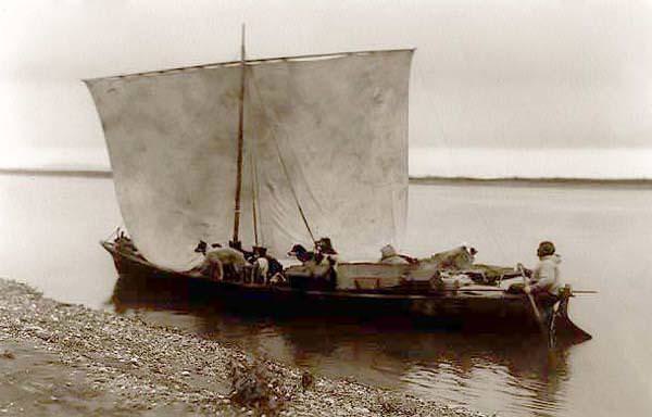 Eskimo with dogs in sailboat, 1929