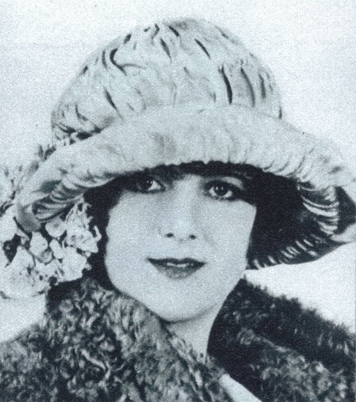 Pauline Garon in a ruched silk hat and fur, 1923