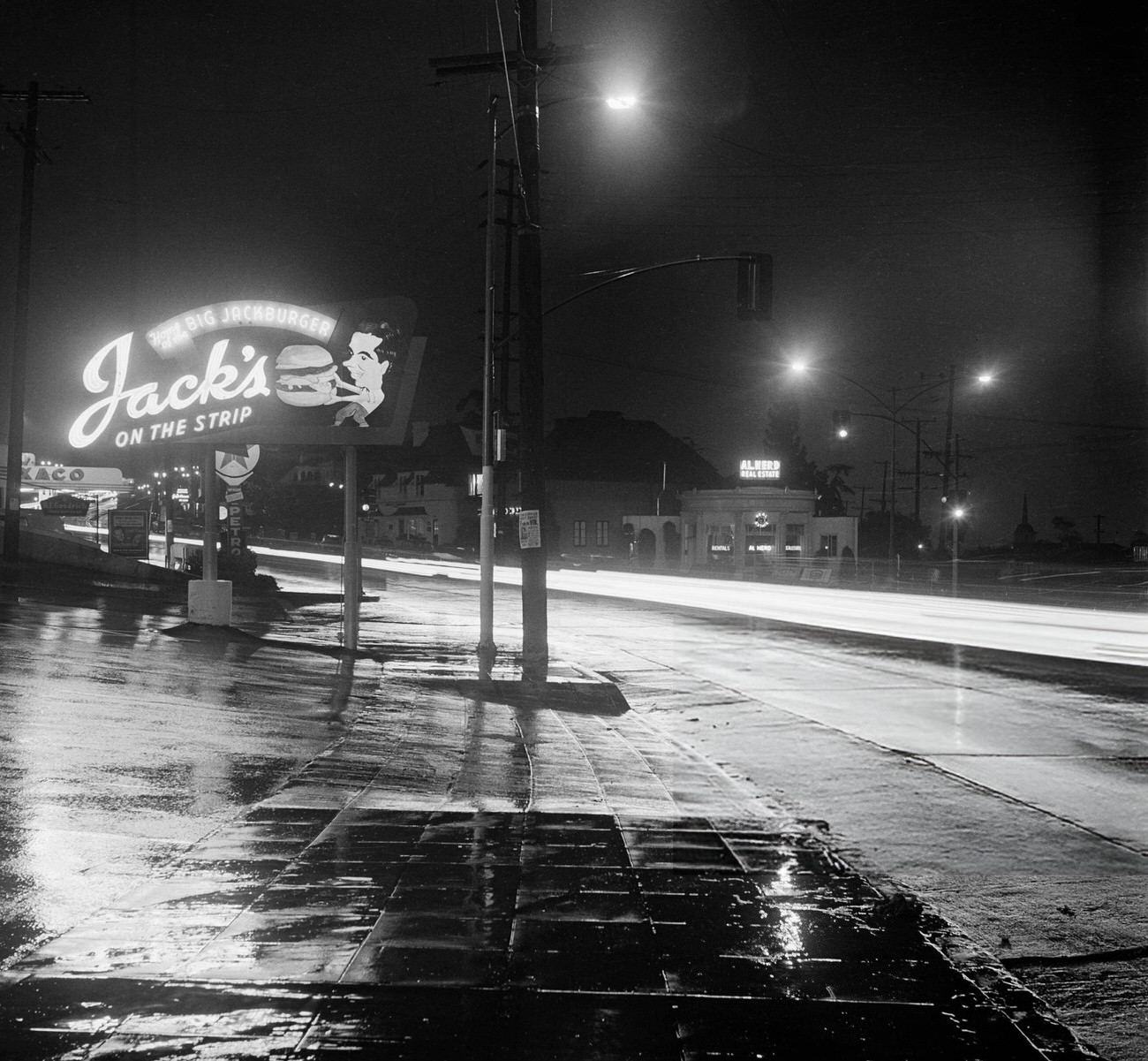 Jacks Hamburger sign on Sunset Boulevard in Hollywood, California, 1950s.