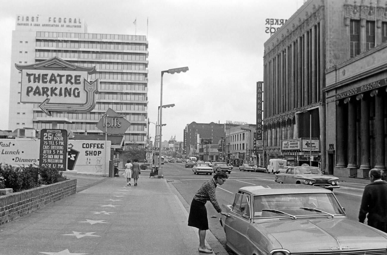 View over Hollywood Boulevard, several stars of various celebrities are emblazoned on the left pavement, Los Angeles, 1962.