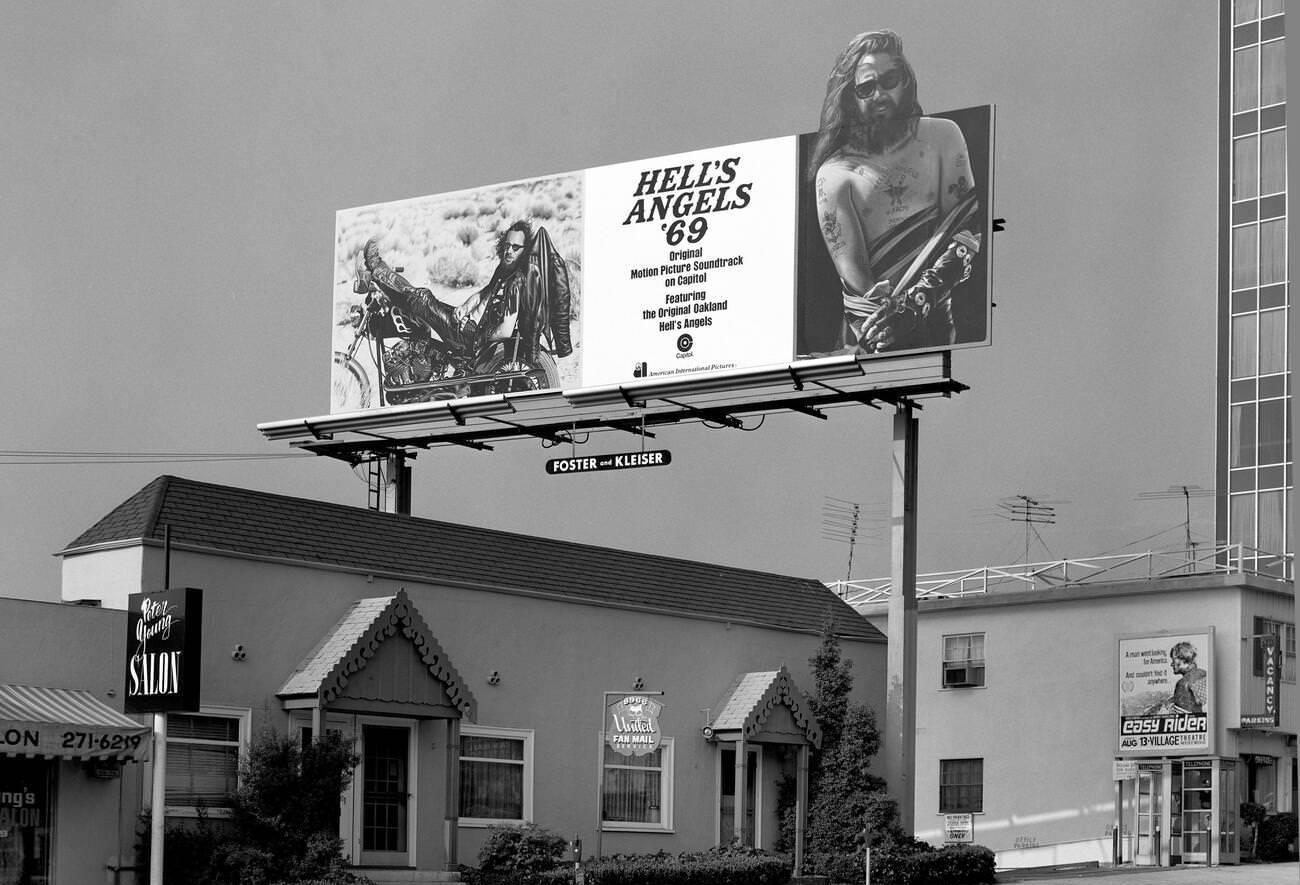 Billboard advertising the movie "Hells Angels '69" on Sunset Strip, West Hollywood, Los Angeles, California, 1969.