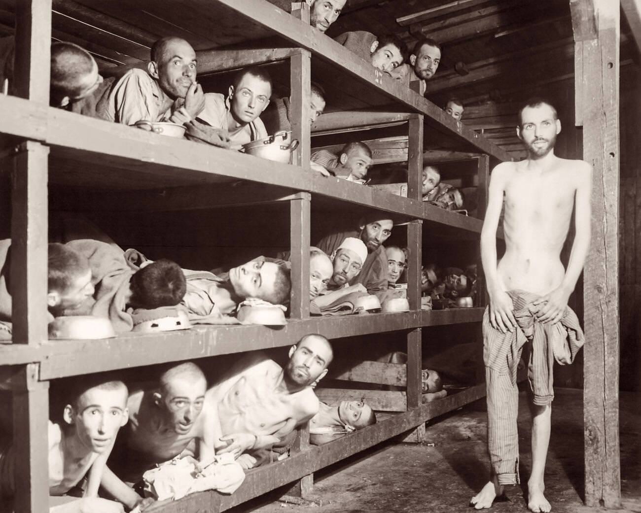 Buchenwald Concentration Camp, 1945. Elie Wiesel, who later received the Nobel Peace Prize in 1986, is the 7th person from the left on the 2nd row from the bottom.