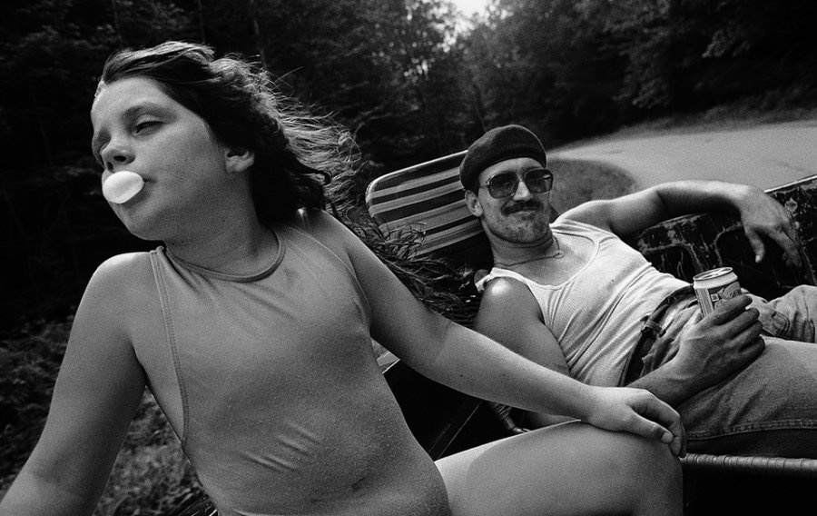 Liza and Uncle Kendall on the way to the swimming hole, 1990