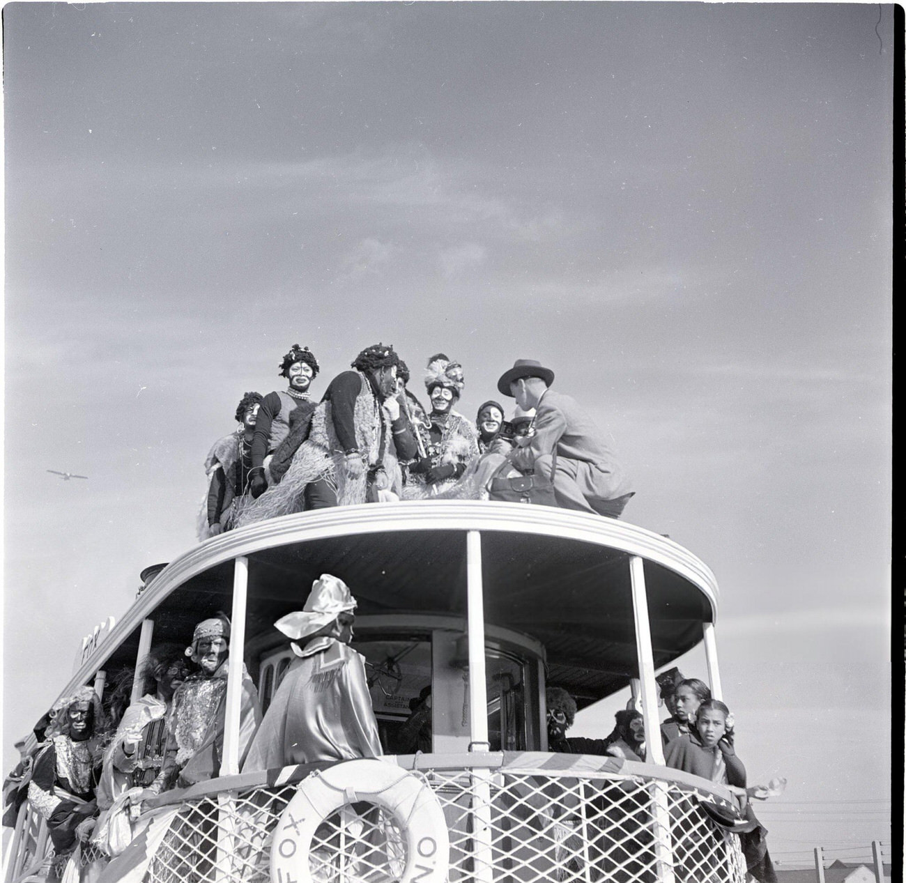 Men on a Ferry for a Mardi Gras Event, Dressed as African Tribesman, 1950s.