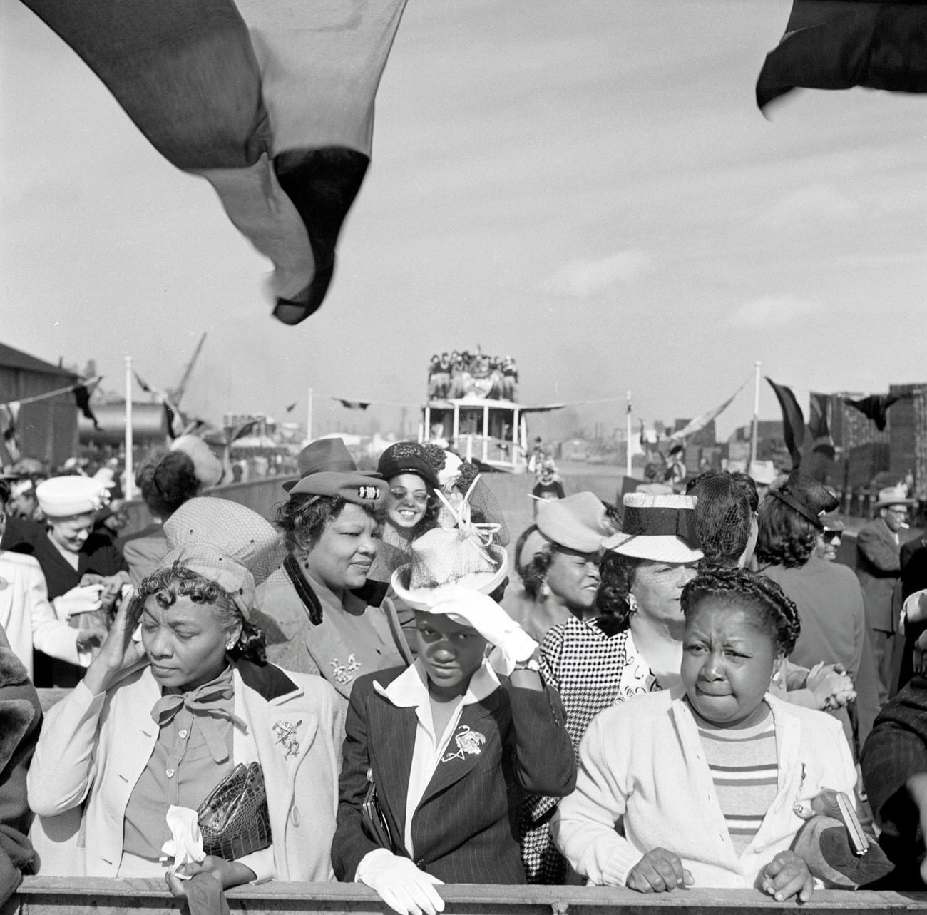 A Group of African American Women on a Barge in a Boat Parade During Mardi Gras, 1950s.