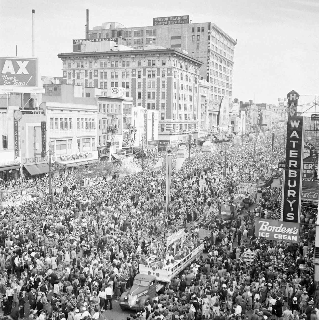 Crowds Throng a Major Street in New Orleans for a Mardi Gras Parade, 1950s.