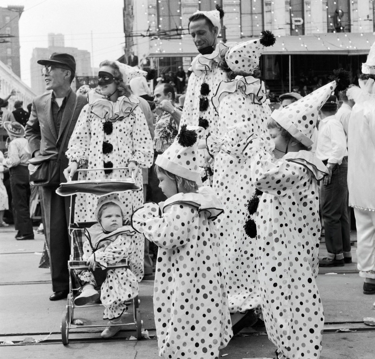 A Family in Fancy Dress Dressed Identically as Clowns at the Mardi Gras, 1950s.