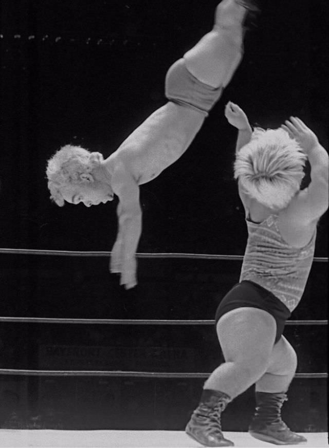 Unknown wrestler getting flipped by Little Bruiser.