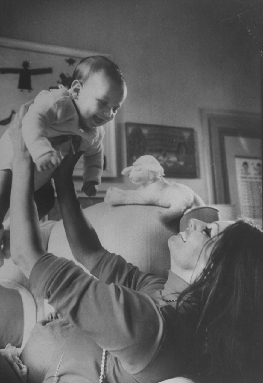 Sophia Loren playing with her son, Carlo Ponti Jr., at her home in Rome, 1969.