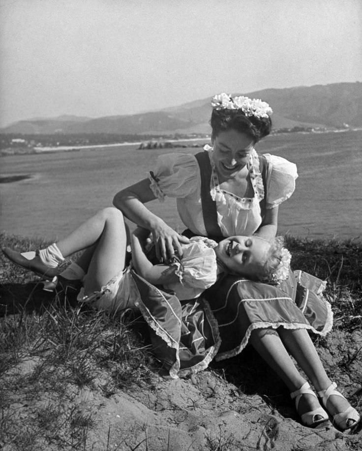 Joan Crawford with her daughter in Monterey, California, 1945.