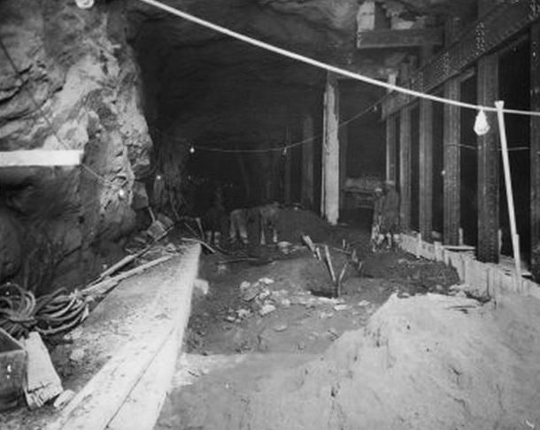 Independent Subway Construction, 173rd to 177th Street under Broadway. Workers in tunnel in background. April 1928.