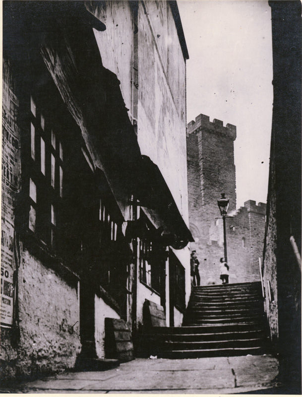 Castle Garth Stairs, (site of many clogmakers shops), looking towards the Castle Keep, 1881.