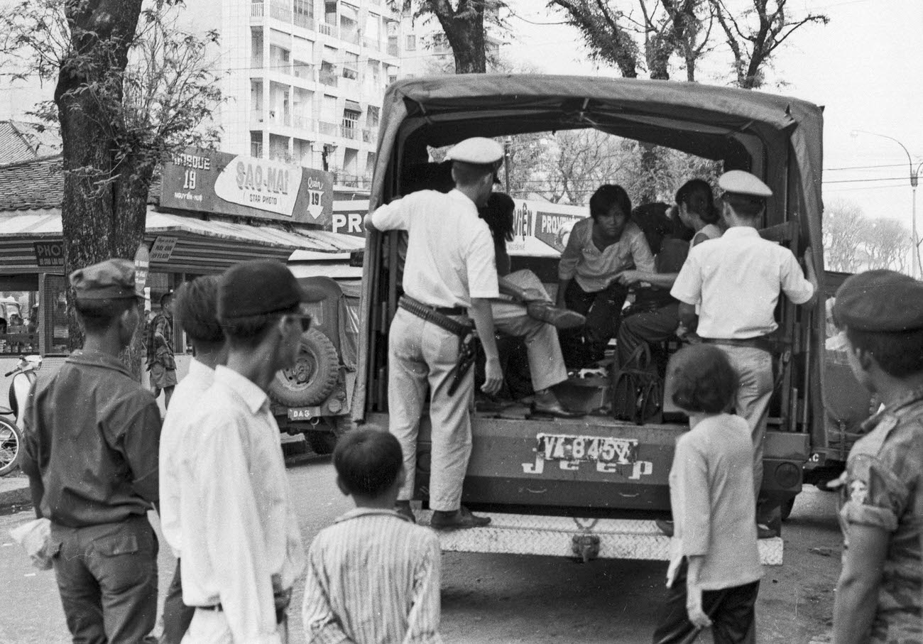 A motorcycle police officer on Nguyen Hu Street in Saigon, 1968.