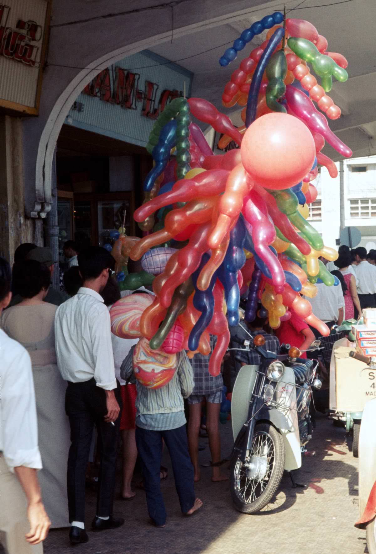 A balloon vendor on Nguyen Hue Street in Saigon, 1968.