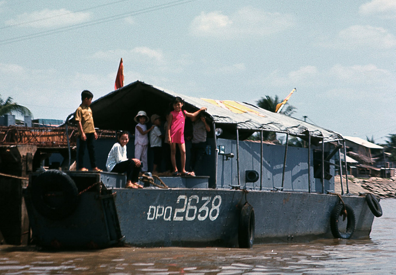 A family on the Saigon River, 1968.