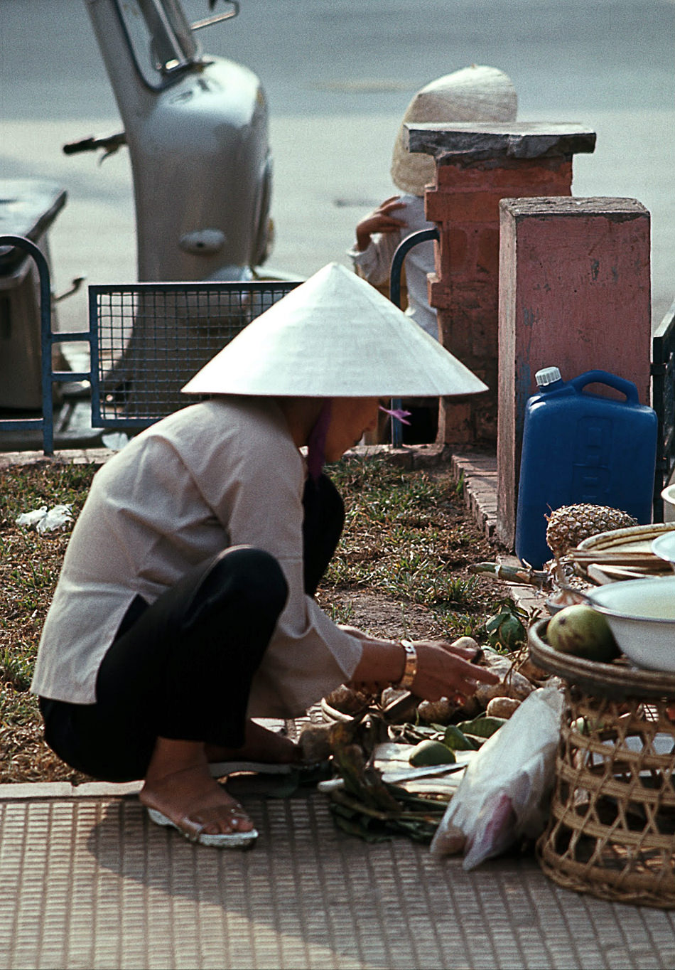 A food vendor at the Saigon docks, 1968.