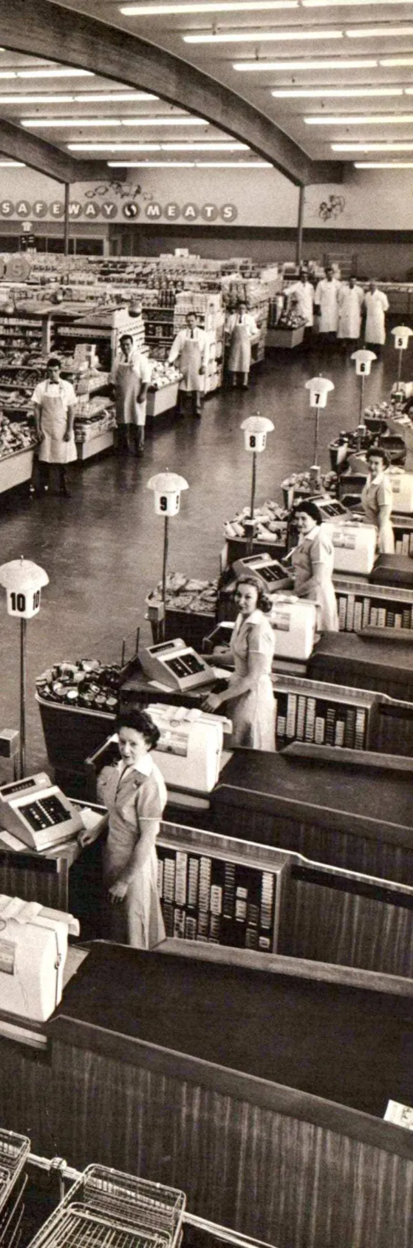 Safeway store staff and checkout lanes in 1960.