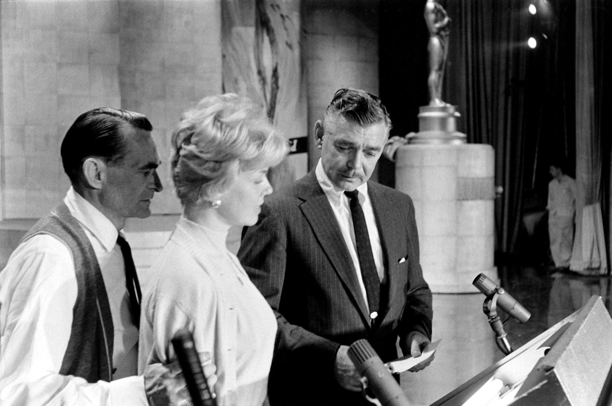 Doris Day and Clark Gable prepared to present the winners of the writing awards, 1958.