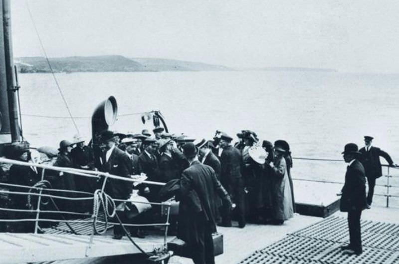 A U.S. doctor inspects passenger’s eyes aboard the doomed ship.