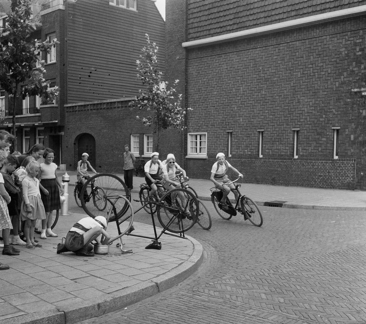 Boys participating in the Tour de France, 1953.