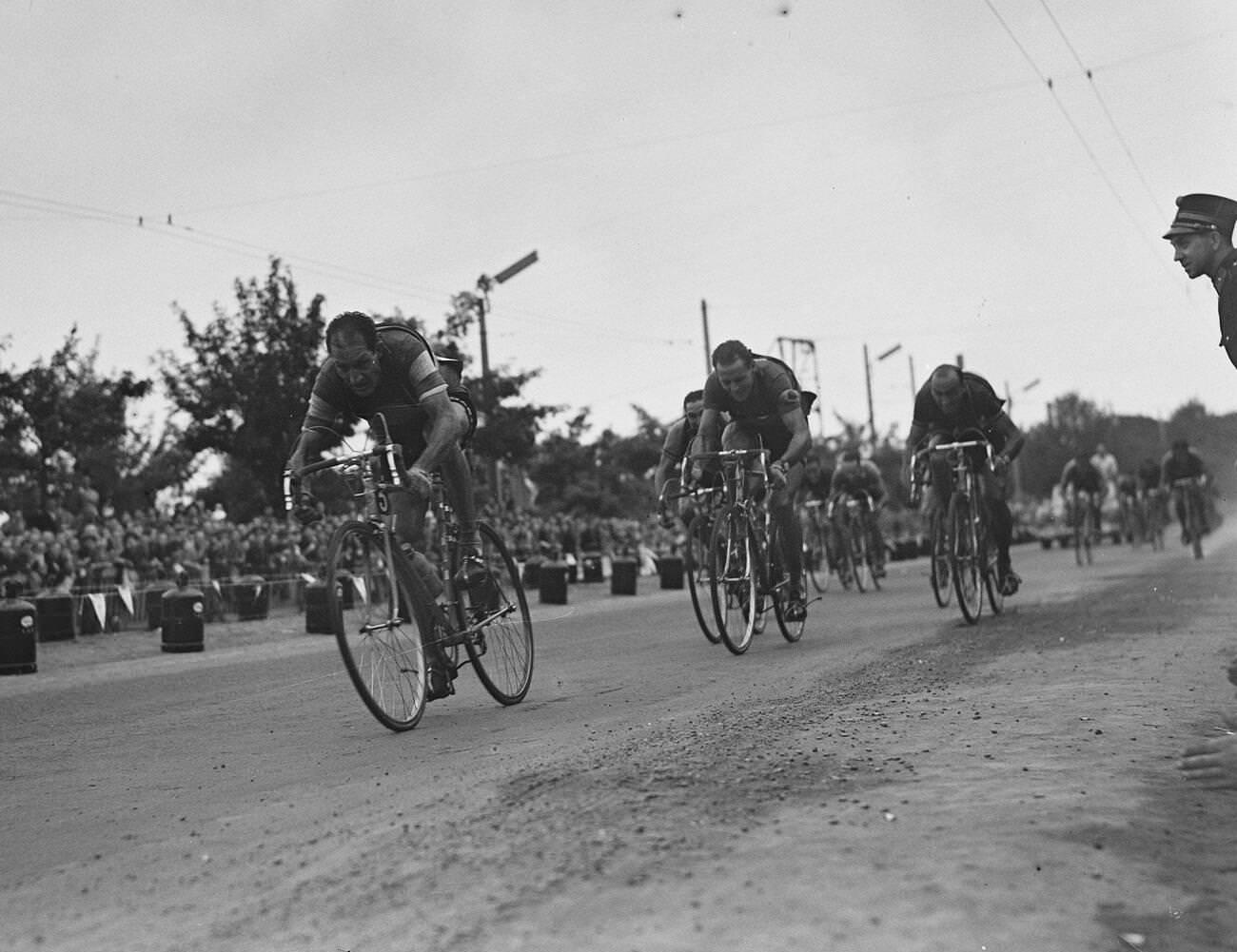 Gino Bartali, Hugo Koblet, and Fiorenzo Magni during stage 2 of the Tour de France, 1953.