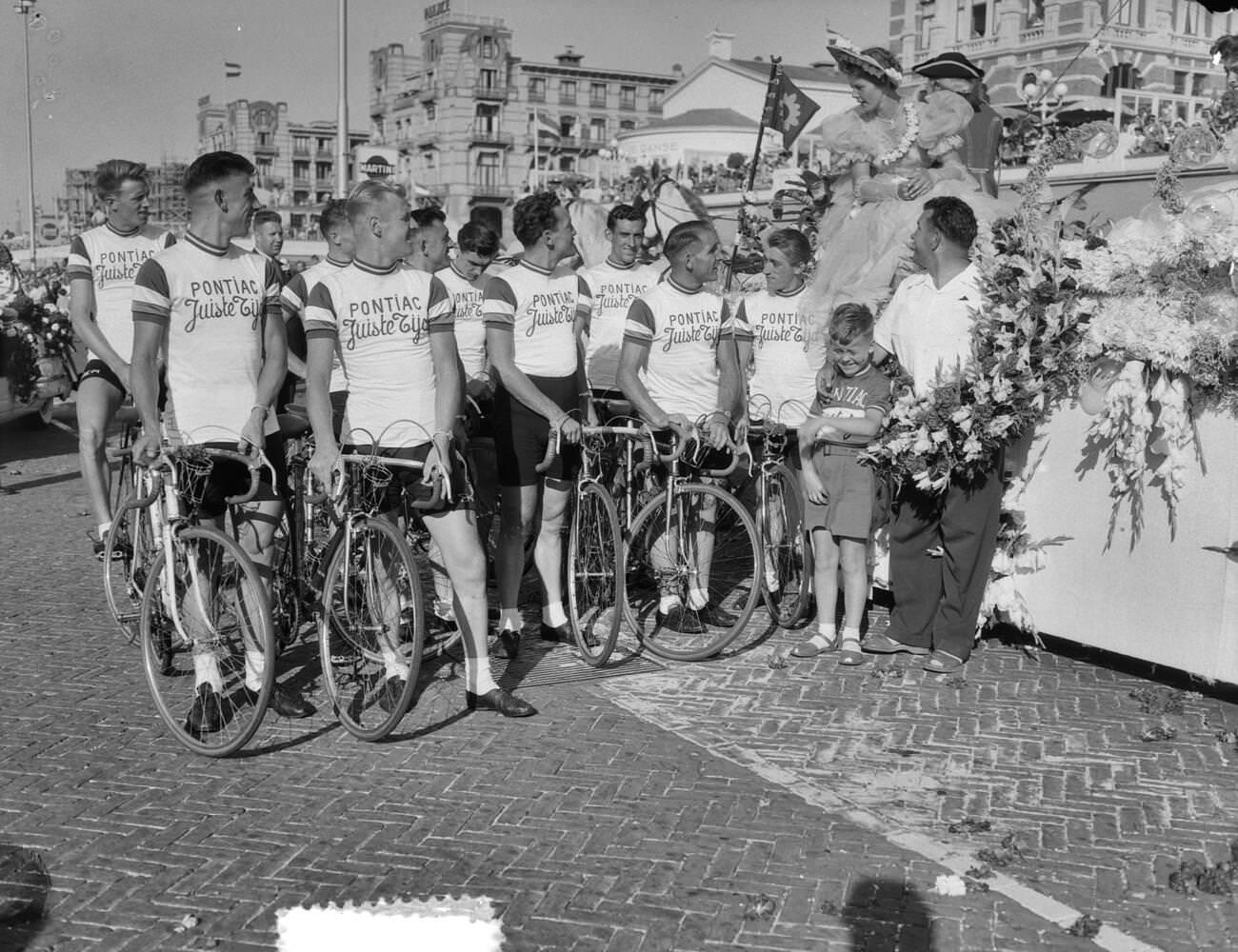 A Tour de France team on a bicycle, 1950s.