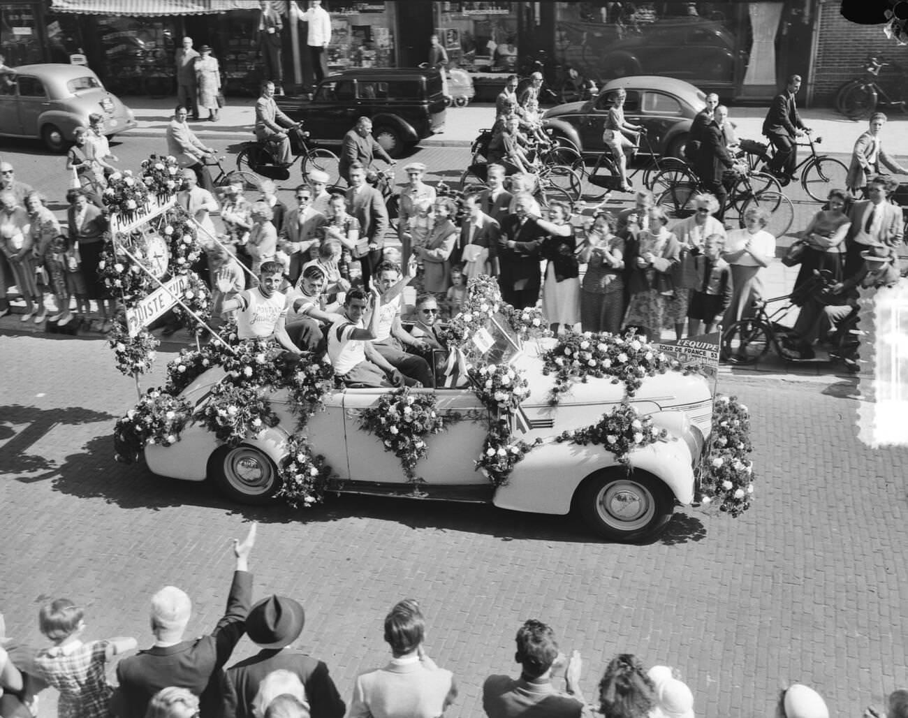 A Tour de France team in a wagon, 1950s.