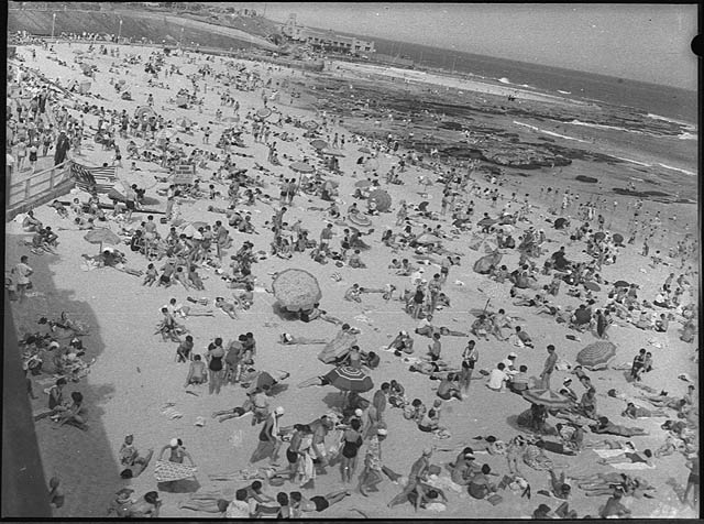 Newcastle Beach on Christmas Day, 1954.