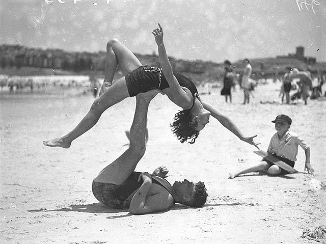 Mr. J. Prentice and Miss J. Howat doing acrobatics at Bondi Beach, January 1935.