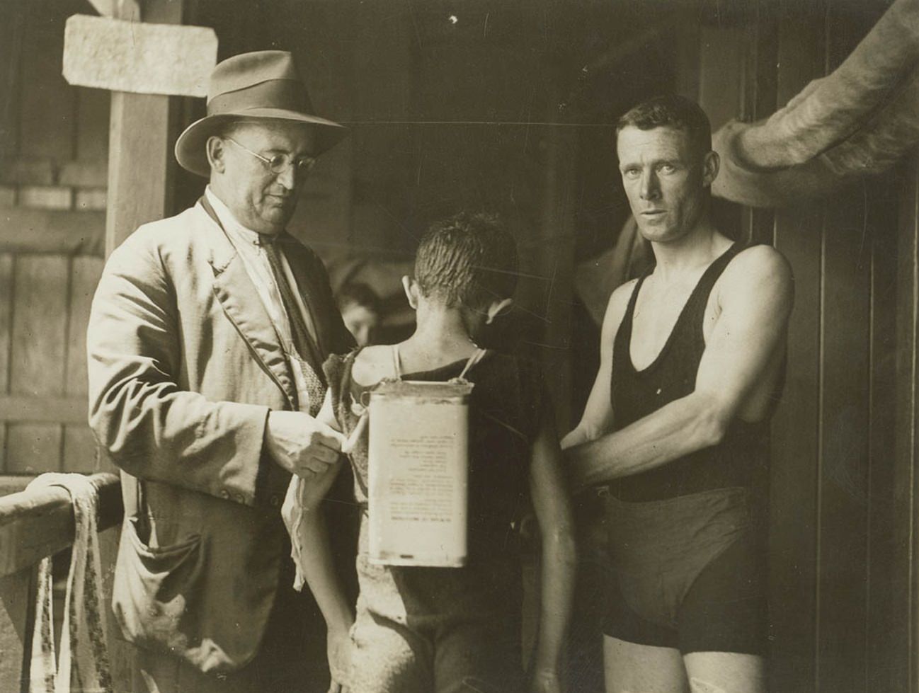 Tin can used as a flotation device at Domain Baths, 1930s.