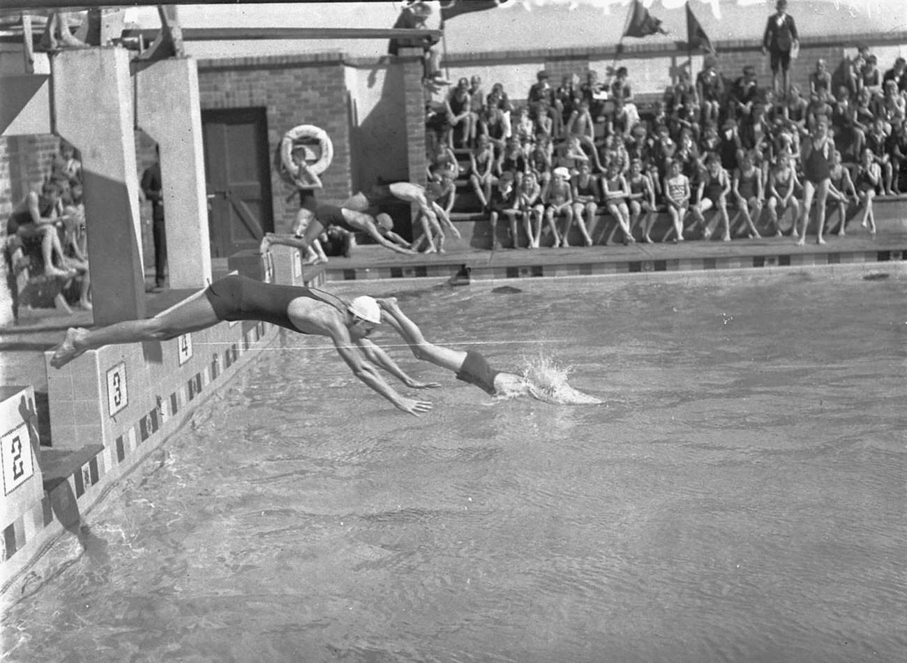 Start of a race at Belmore Central School's swimming carnival, Enfield Pool, March 1935.