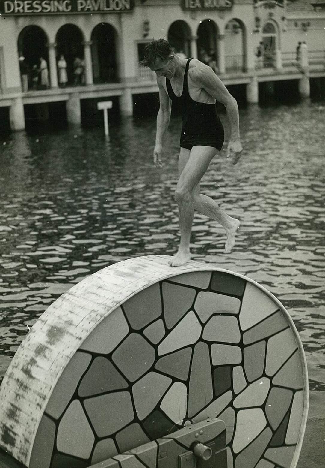 Balancing wheel at Manly Harbour pool, 1930s.