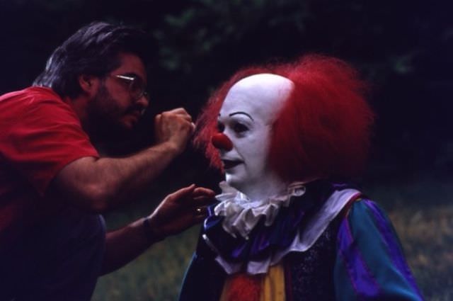 Pennywise getting his makeup done on the set of “It”